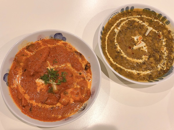 Red is butter chicken curry and brown is bean curry.